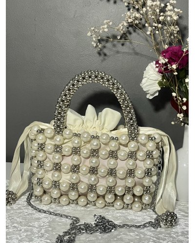 Sac à main en perles ivoire et argenté